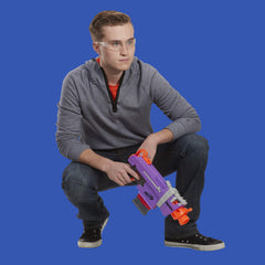 Nerf Fortnite SMG-E Blaster in a battle scene for team play.