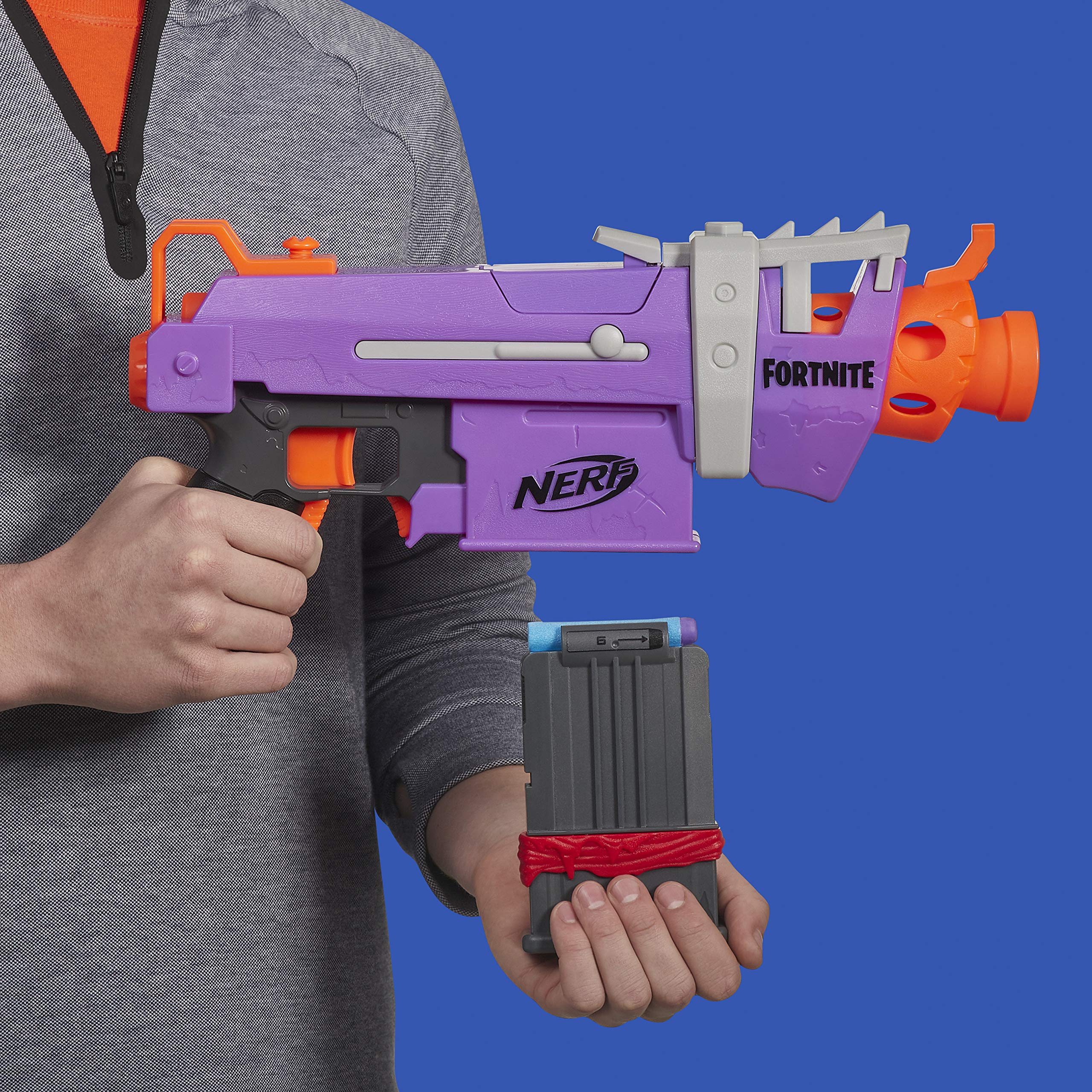 Nerf Fortnite SMG-E Blaster includes six official Elite Darts for battles.