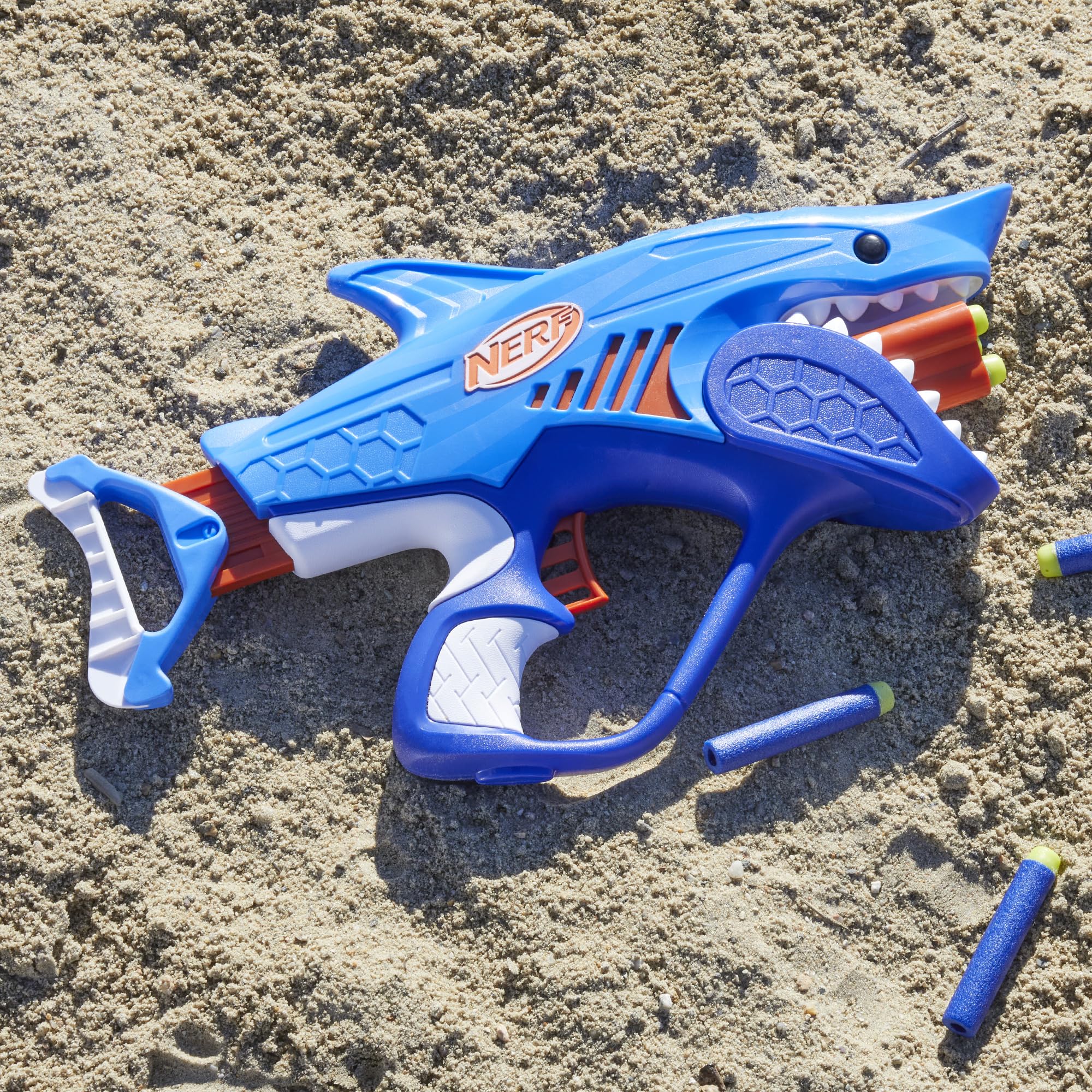 Shark-design fuels imaginative play and themed pretend battles.
