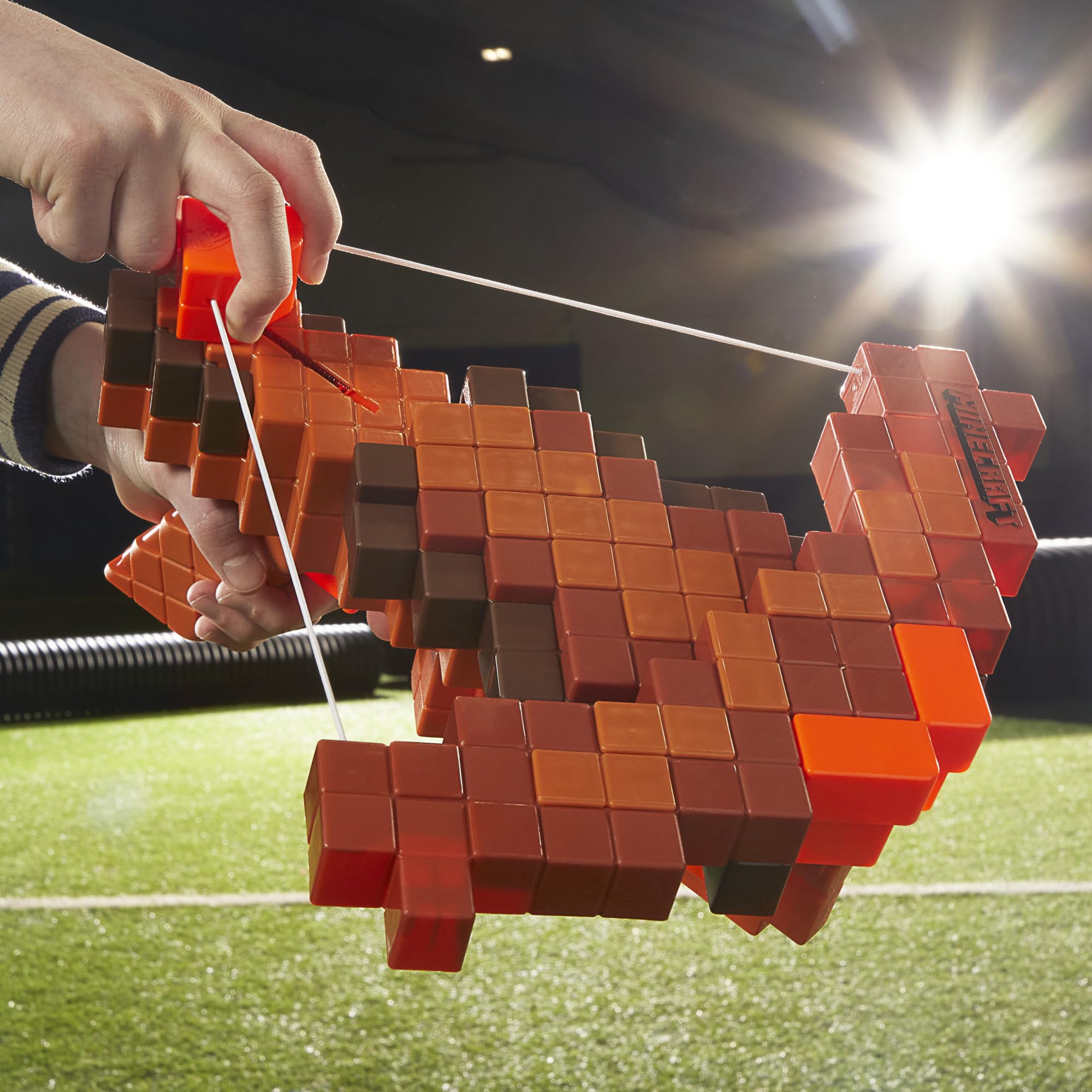 Nerf Minecraft crossbow in an outdoor battle setup for dynamic play.