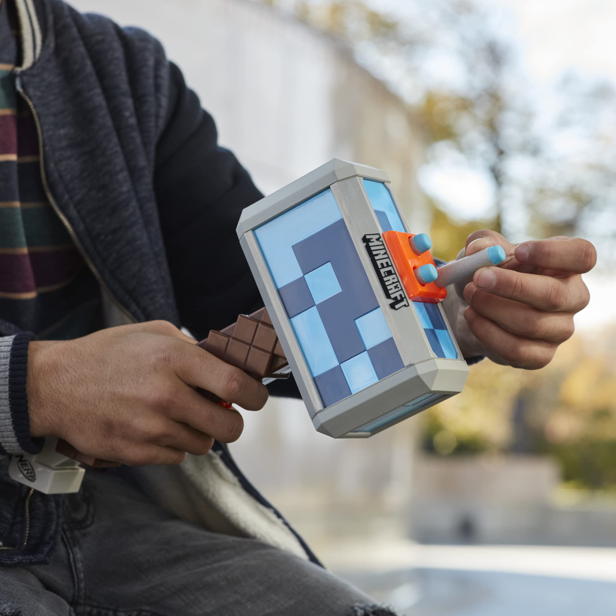 Nerf Minecraft Stormlander hammer 3-dart capacity shown for triple shots.