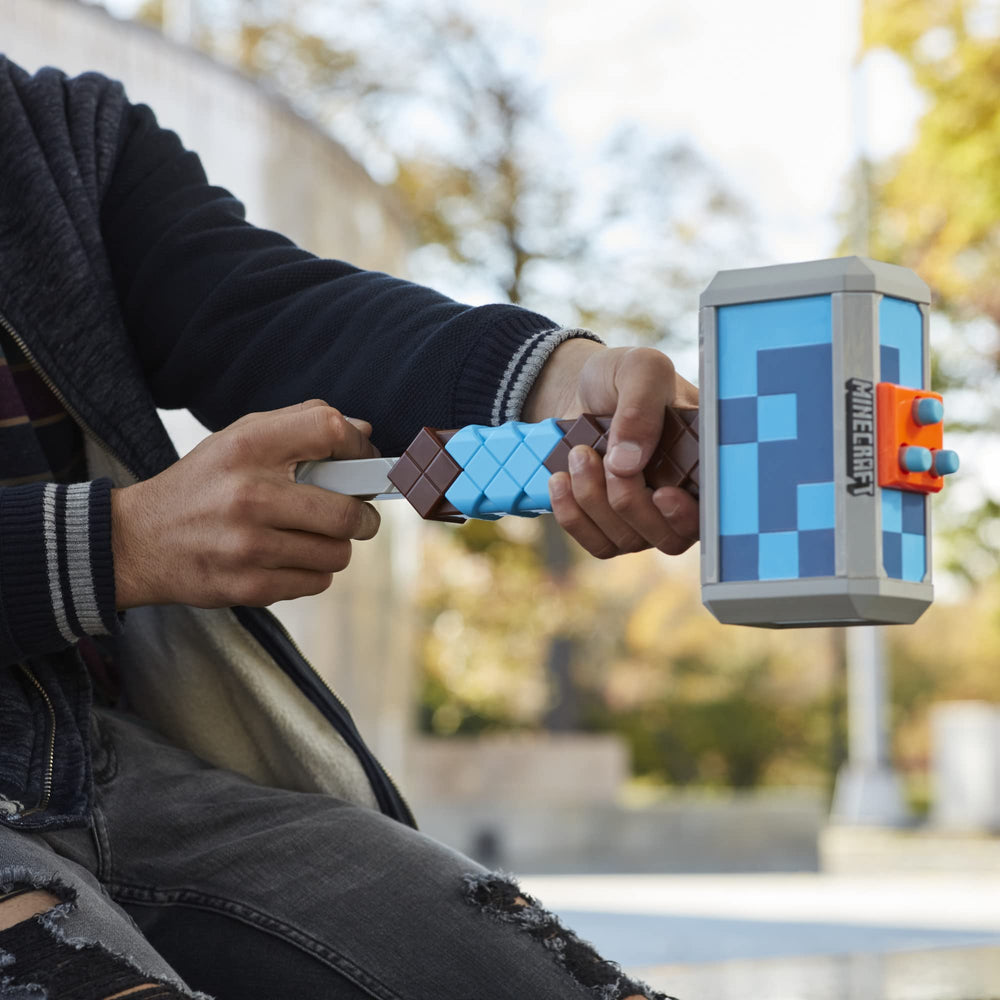 Nerf Minecraft Stormlander hammer priming handle shown for rapid fire.