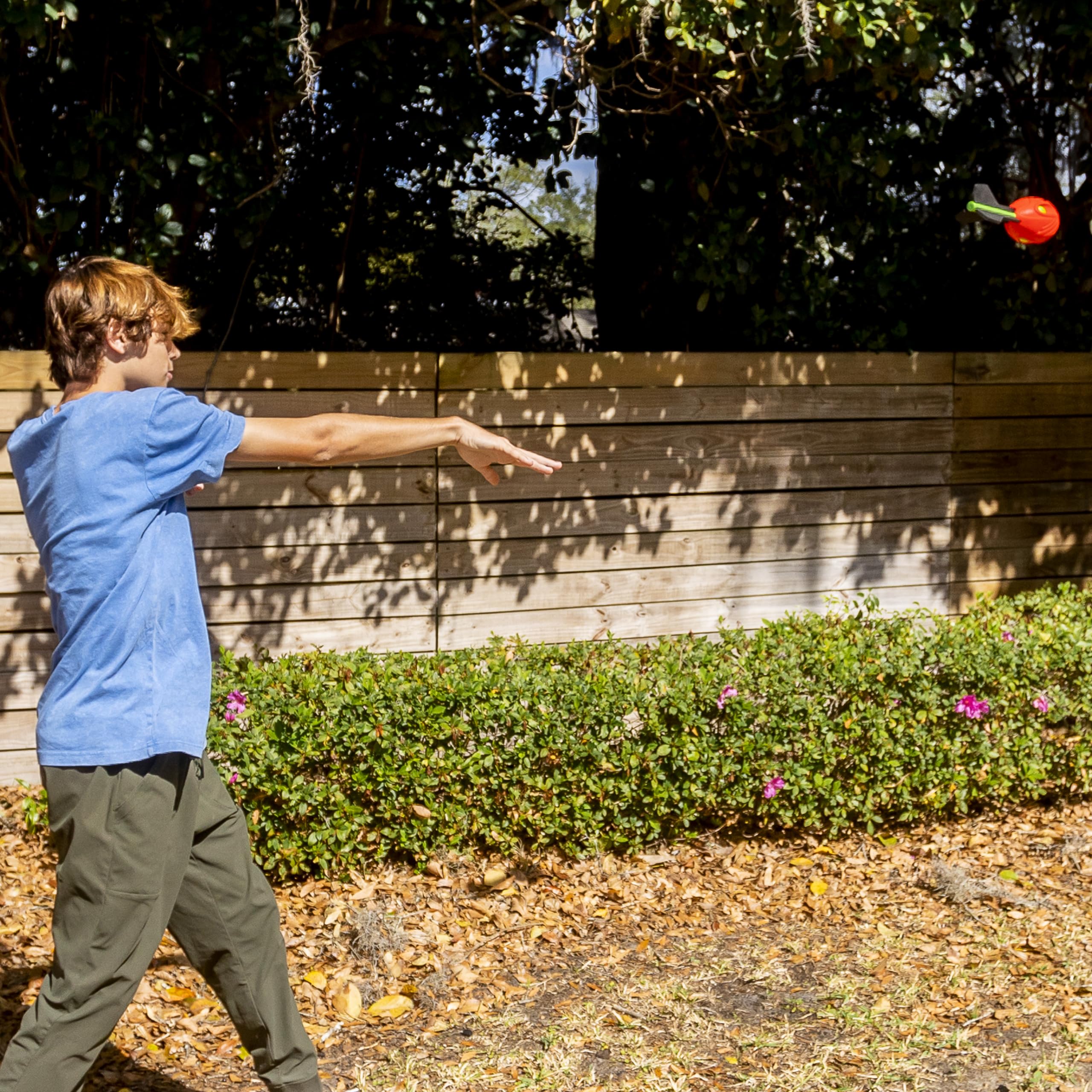 NERF Vortex Aero Howler ball enabling long-distance passes in yard play
