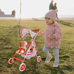 The New York Doll Collection retractable sun shield canopy shields dolls from sun during outdoor adventures.