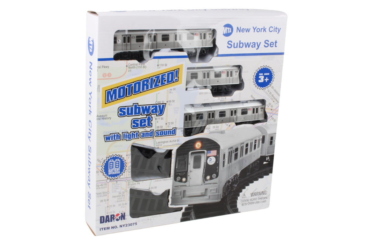 New York MTA train set headlight glow enhances night display.