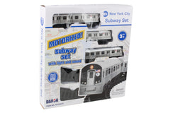 New York MTA train set headlight glow enhances night display.