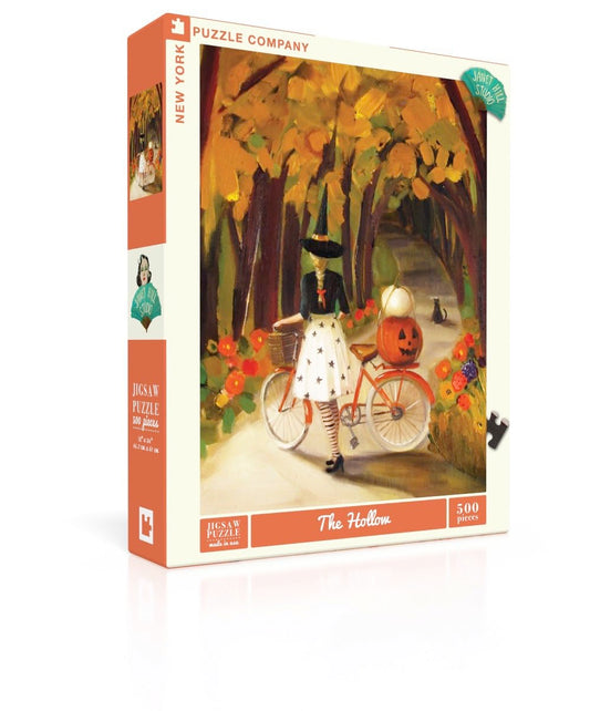 New York Puzzle Company Janet Hill The Hollow 500-piece puzzle for cozy family nights.