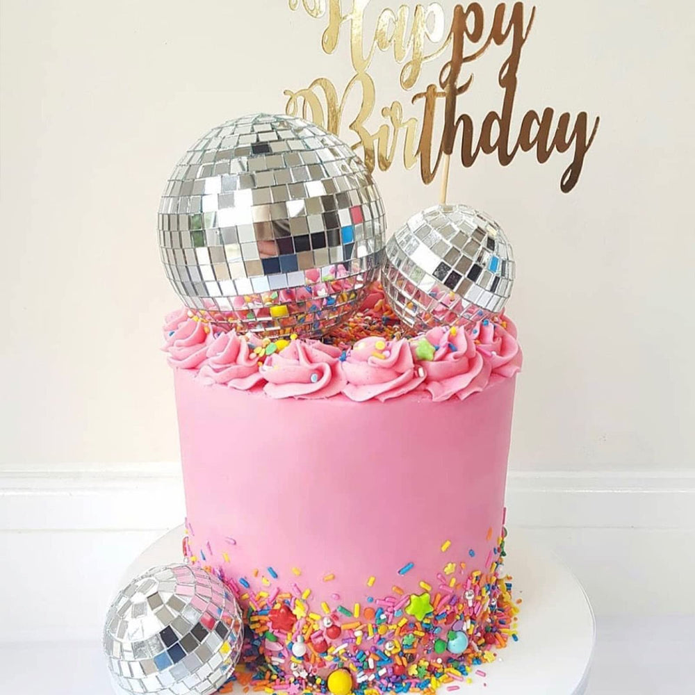 Newmemo 2cm cupcake toppers create tiny disco vibes on treats.