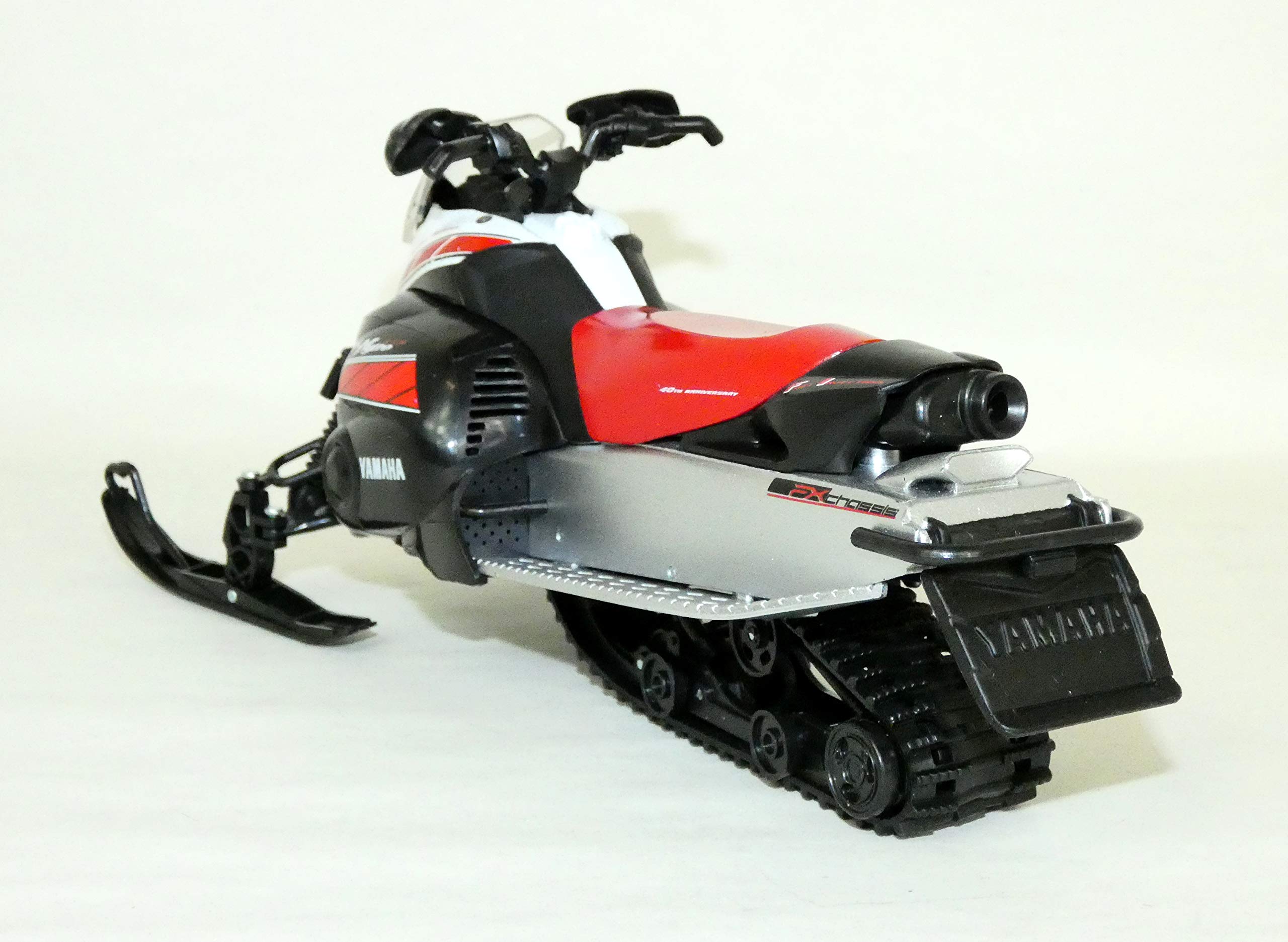 NewRay Yamaha FX Snowmobile model color close-up captures white and red finish.