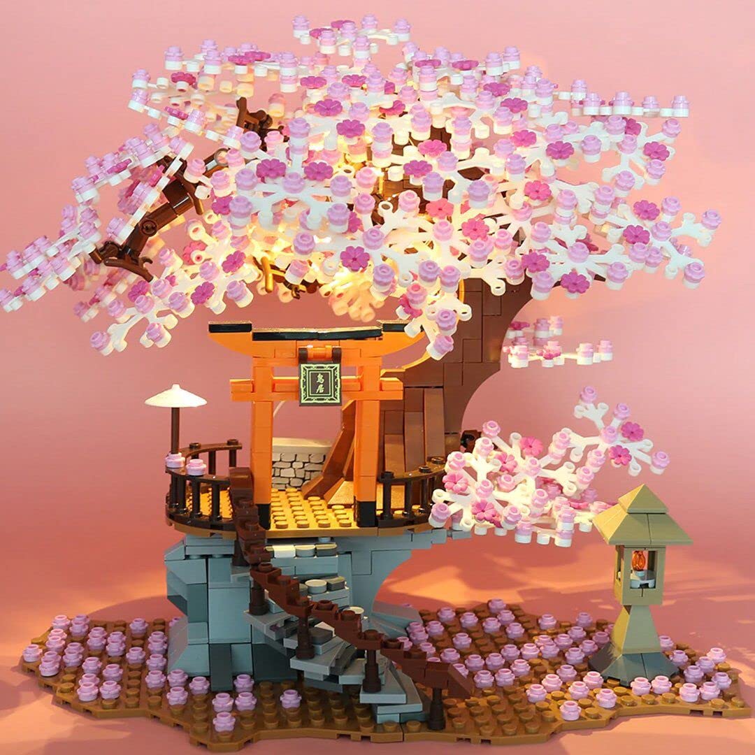 NEWRICE Sakura Tree House Lights LED illumination showing cozy nighttime glow.