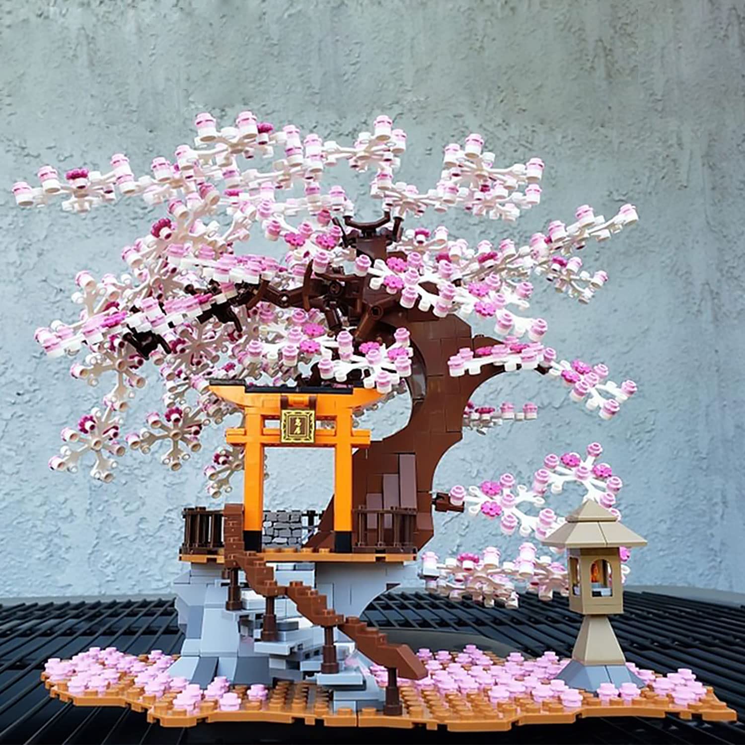 NEWRICE Sakura Tree House Lights side angle highlighting intricate brick detailing.