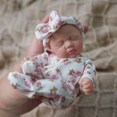 Newtotlove 7 inch preemie body highlights palm size portability for on the go play