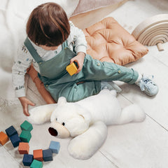 Niuniu Daddy polar bear weighted toy fur close-up shows soft fluffy texture for cozy hugs.