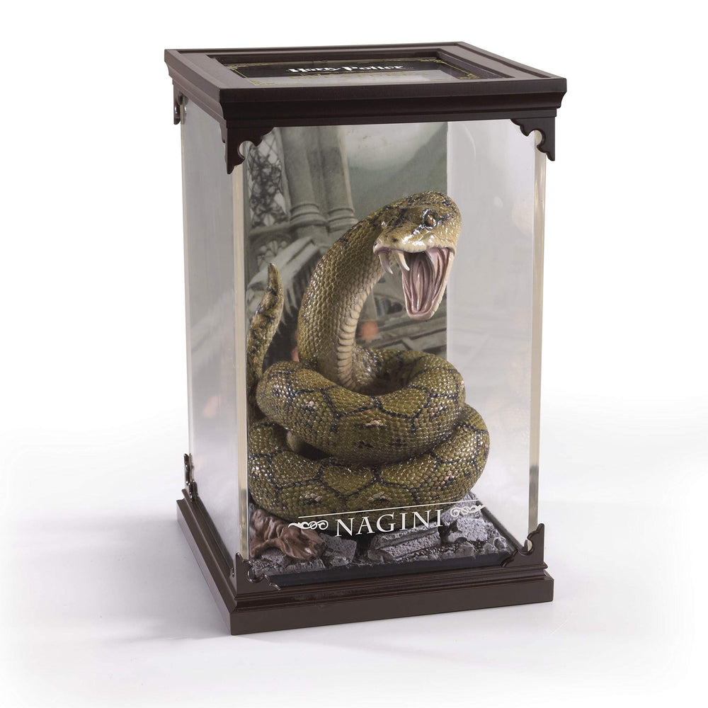 Nagini resin figurine with removable cover for flexible display options.