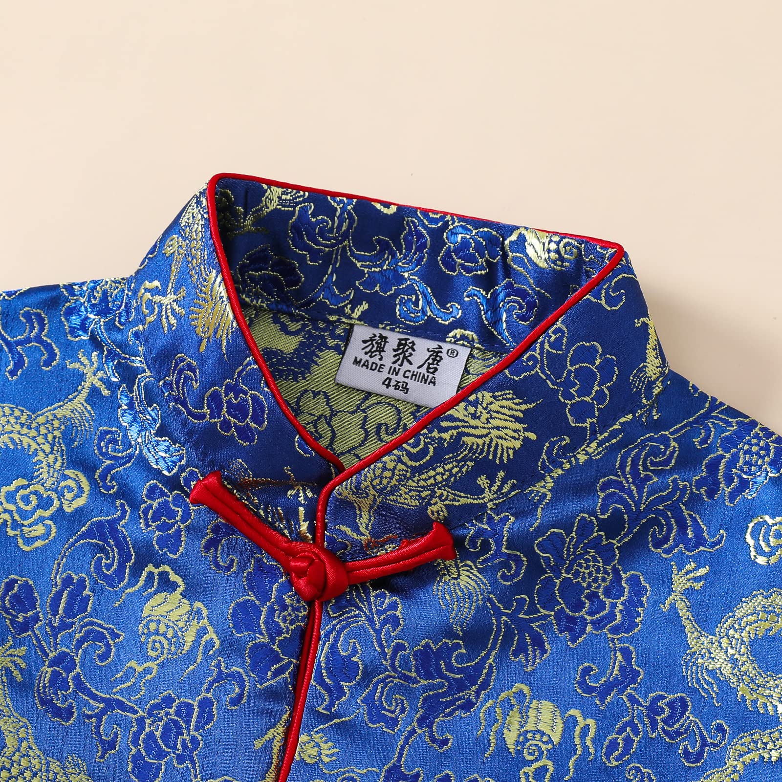 Noubeau boy tang suit festive Chinese New Year look for celebrations.