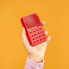 NPW Classic Sound Machine side angle showing compact pocket-sized convenience.
