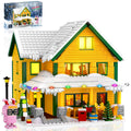 Nubee Christmas House with LED interior lights brightens holiday display.