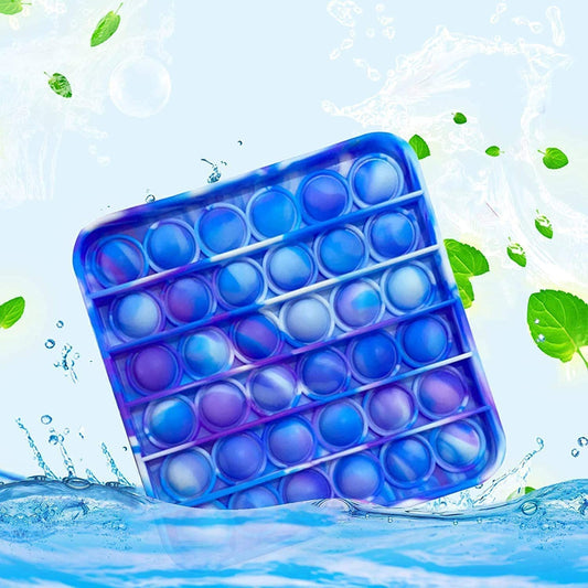 NUENUN push-pop side view—compact stress-relief toy for on-the-go use.