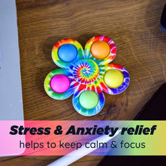 Nutty Toys fidget spinner close-up of popping buttons for calm focus.