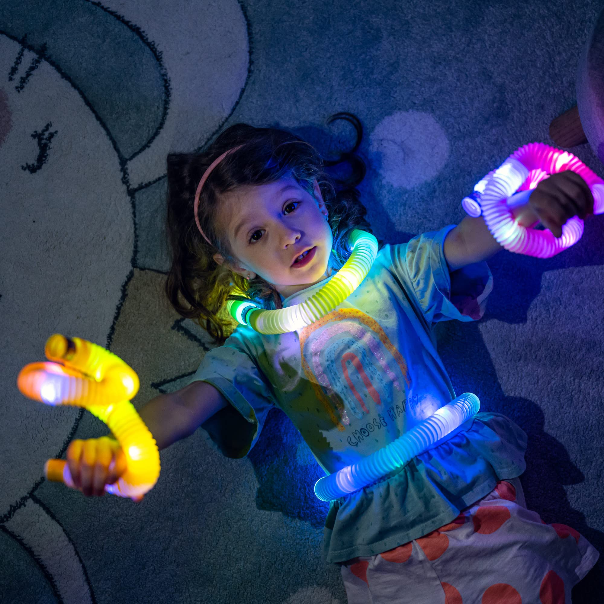 Nutty Toys pop tubes teach letters and shapes through hands-on exploration.