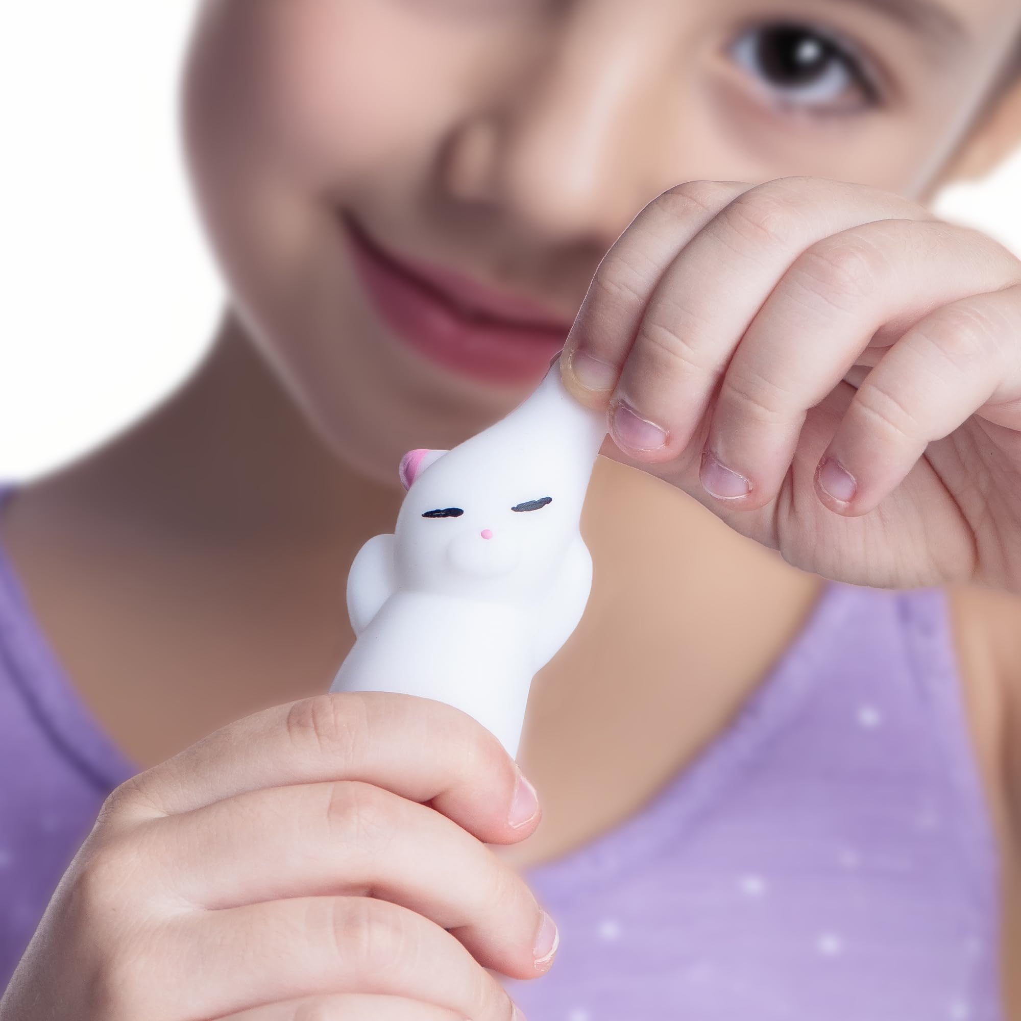 Nutty Toys soft silicone kitten closeup showcases tactile squishiness and durability.