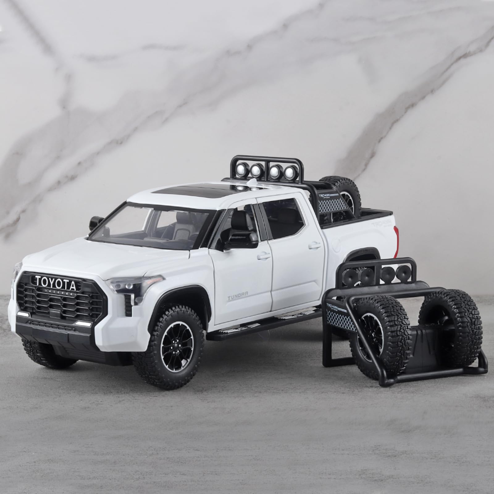 OANMYJJO White Tundra diecast truck open doors for interactive play features.