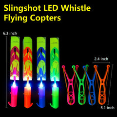 OceanWings glow helicopters in air for a captivating night-time display.