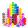Odoorgames translucent linking cubes on a light table showing color glow for early math play