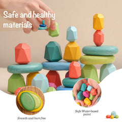 OESSUF Stacking Rocks close-up of smooth wooden stones with safe paint