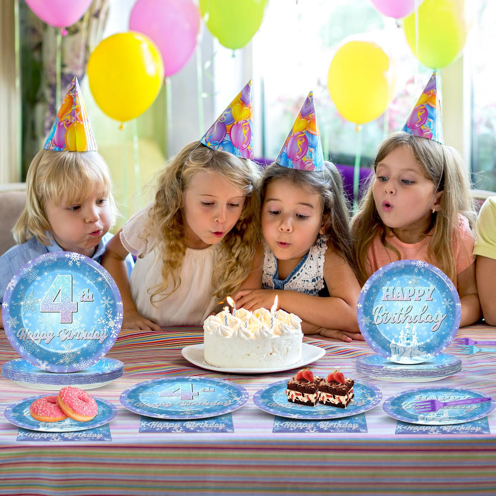 Oitnlaughter party table setup featuring snowflake theme