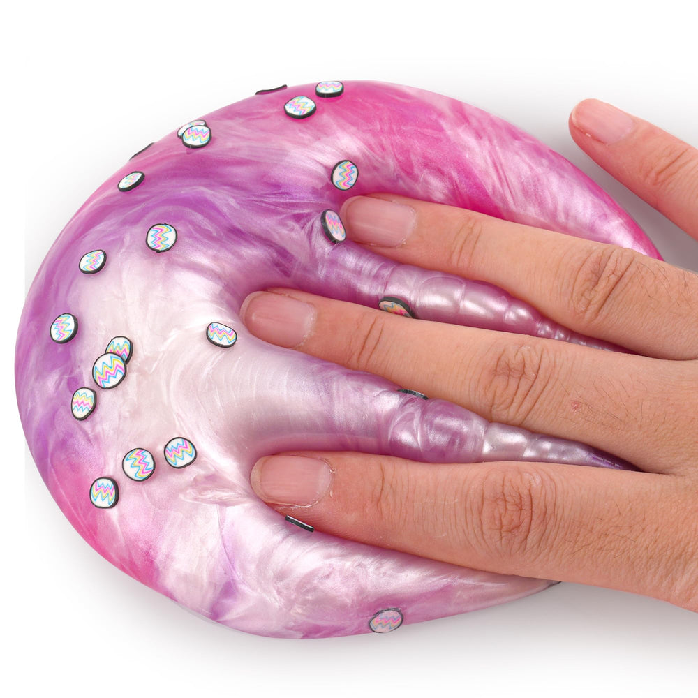 Okaybee party favor slime bag demonstrates a bright, shareable activity.