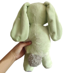 Okidg Knuffle Bunny plush on shelf, soft stuffed animal ideal for gifting.