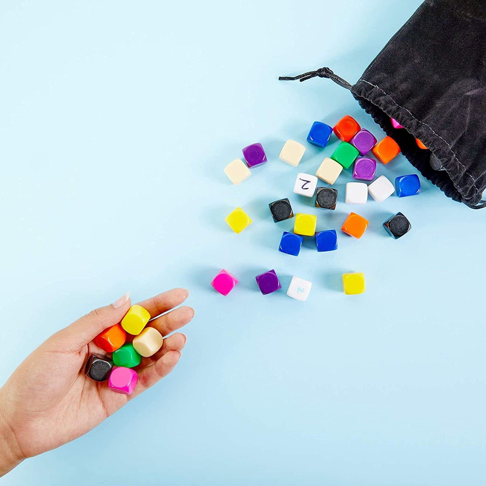 Okuna Outpost colorful dice cubes: 10 colors spark creative game design.