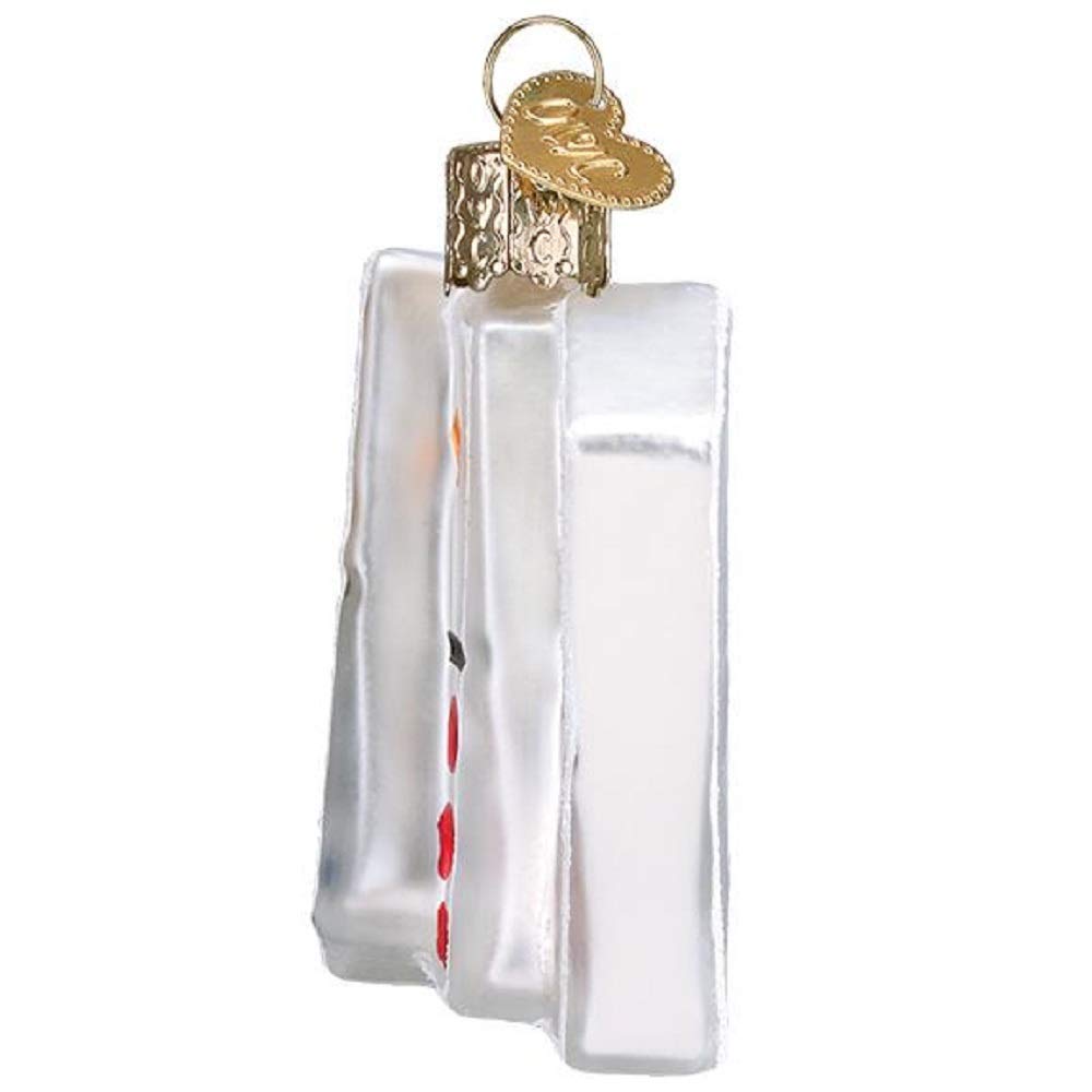 Old World Christmas Dominos ornament featuring glittered edges and sparkle on the tree