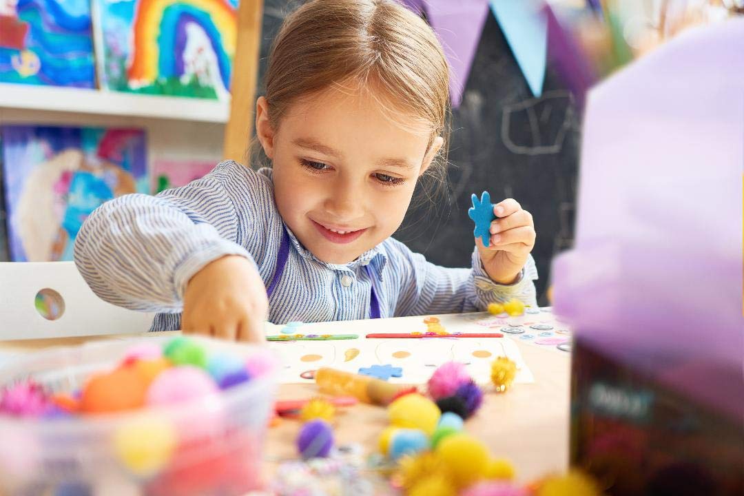 Olly Kids brushes and glue tools support smooth, mess-friendly crafting.