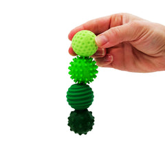 ONO Signets Emerald with dimple texture for tactile stress relief during work.