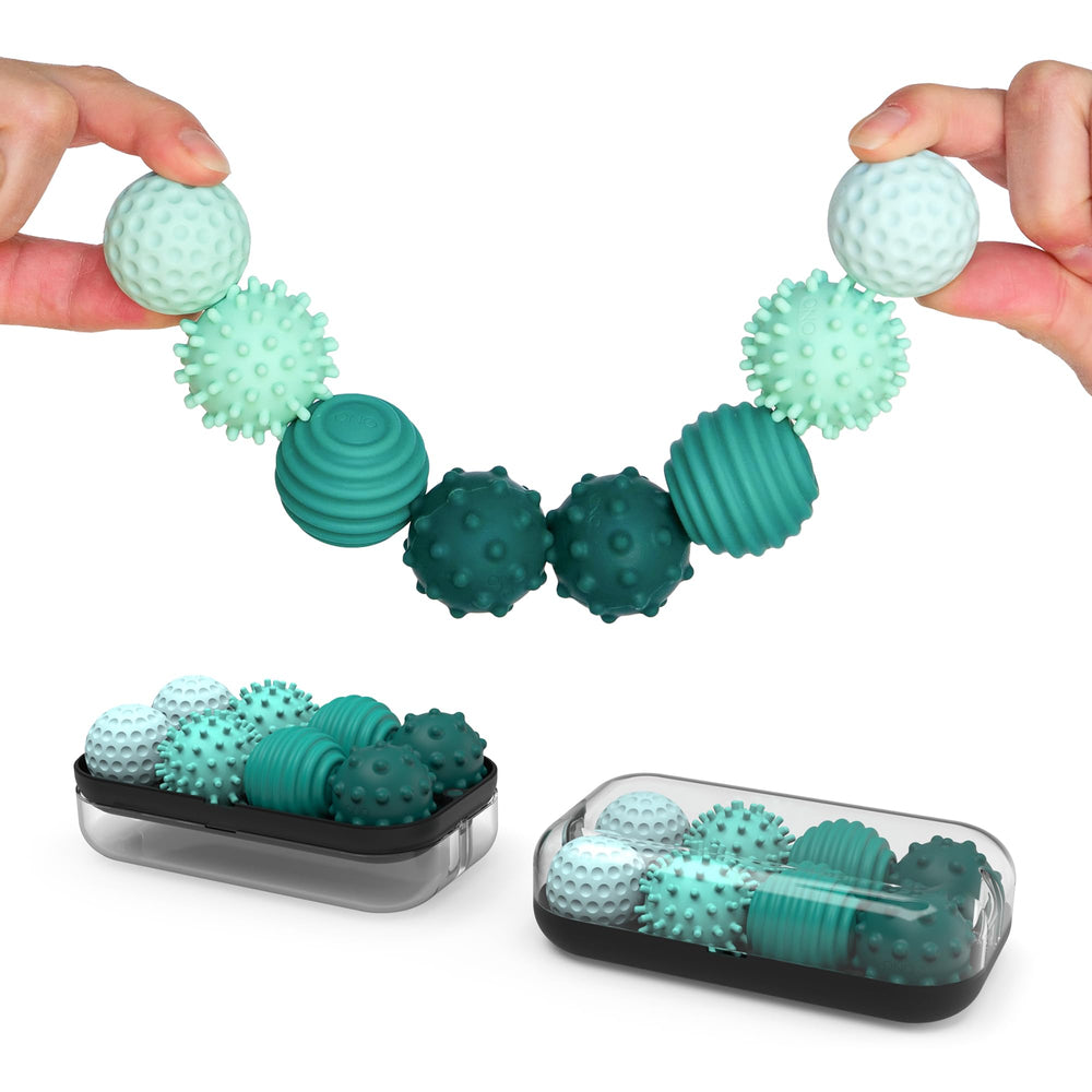 ONO Signets turquoise dimples close-up showing tactile silicone texture.