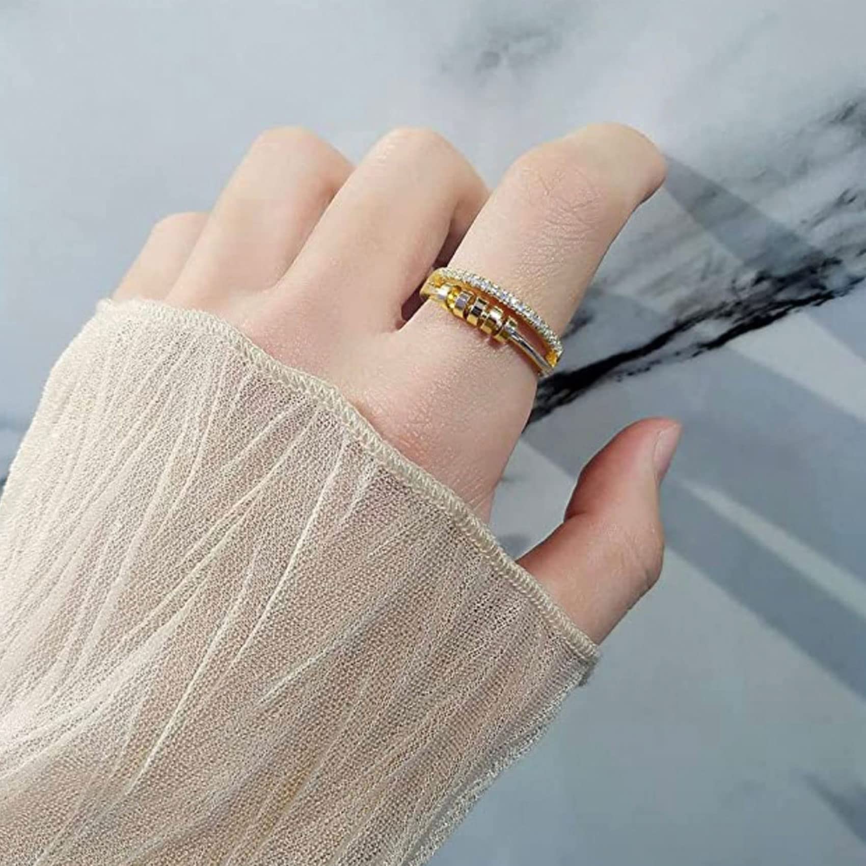 OOOPEL adjustable anxiety ring shown on finger for a comfortable fit.