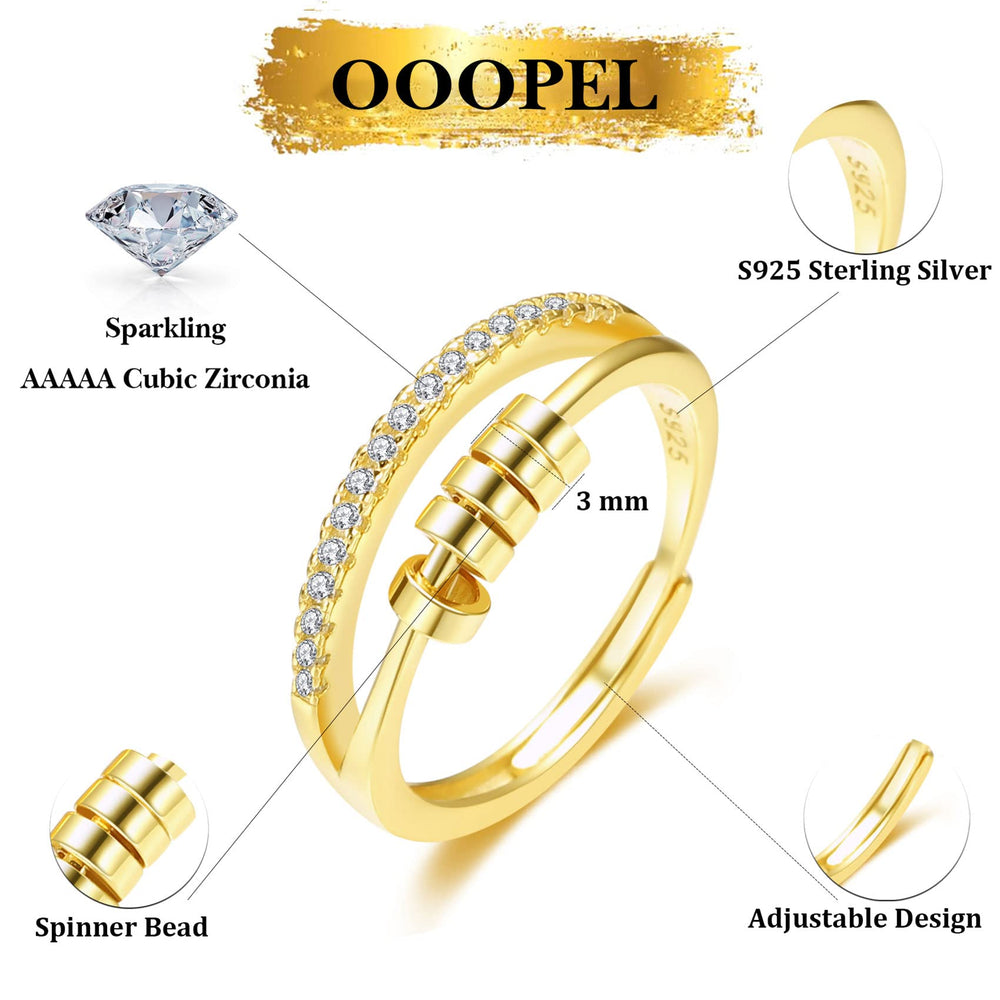 OOOPEL spinner ring close-up highlighting cubic zirconia detail and smooth rotation.