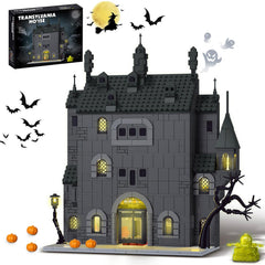OQMI Haunted House light-up pumpkins create festive Halloween ambiance.