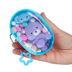 The Orb Factory Tabalicious blue capsule pouch for on-the-go storage.