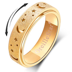 OreilleStar anxiety ring on finger with moon and star detail for focus