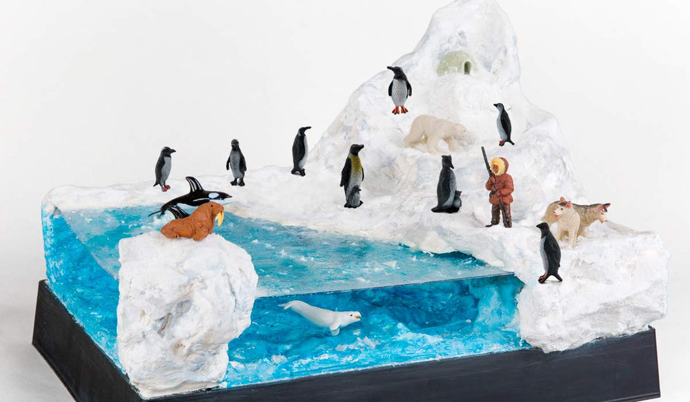 ORZIZRO penguin cake topper decor for parties and desserts.