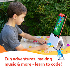 Osmo Awbie character on table interacts with tangible coding blocks.