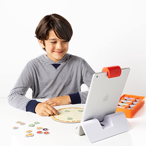 Osmo Pizza Co. box contents showing storage for game pieces