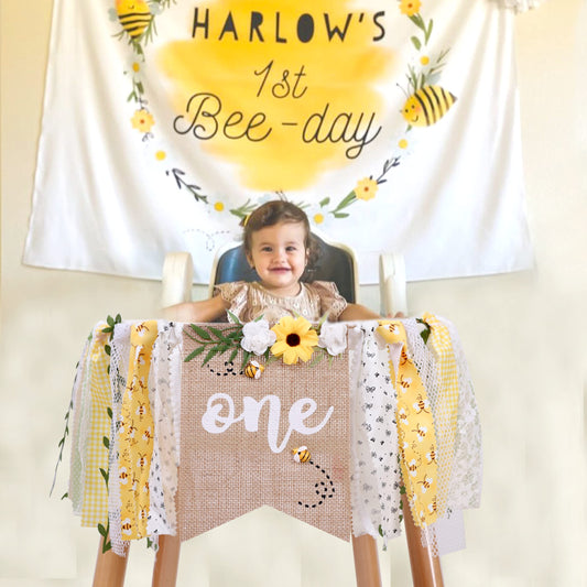 OTURGC Bee Theme Banner on high chair adds a festive focal point.