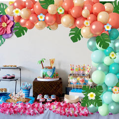 Ouddy luau background decor creates a tropical vibe for events