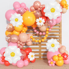 Ouddy Party daisy balloon arch assembly forms a whimsical backdrop for celebrations.