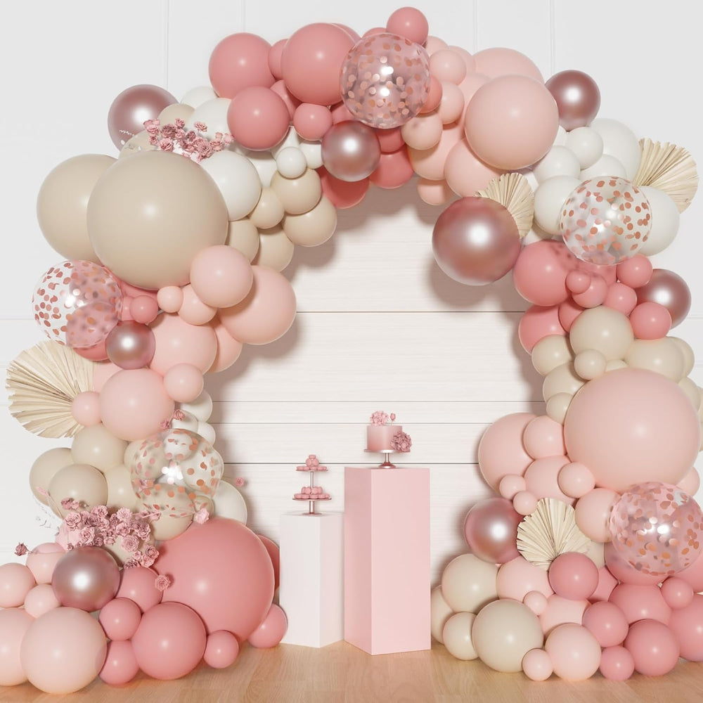 Ouddy Party dusty pink arch setup as stylish backdrop