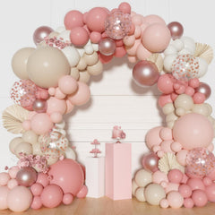 Ouddy Party dusty pink arch setup as stylish backdrop
